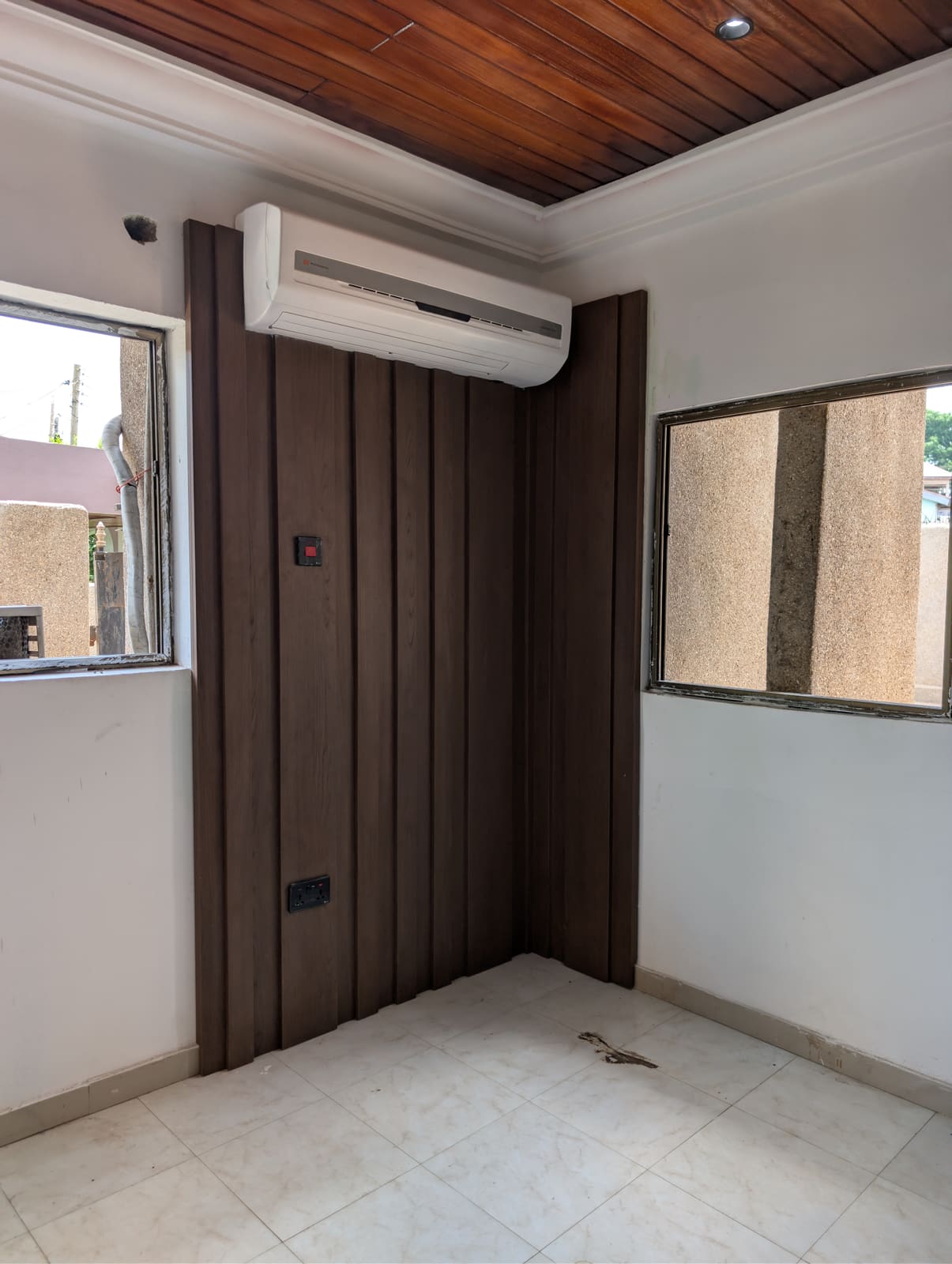 Wood slat wall paneling detail, Achimota guesthouse