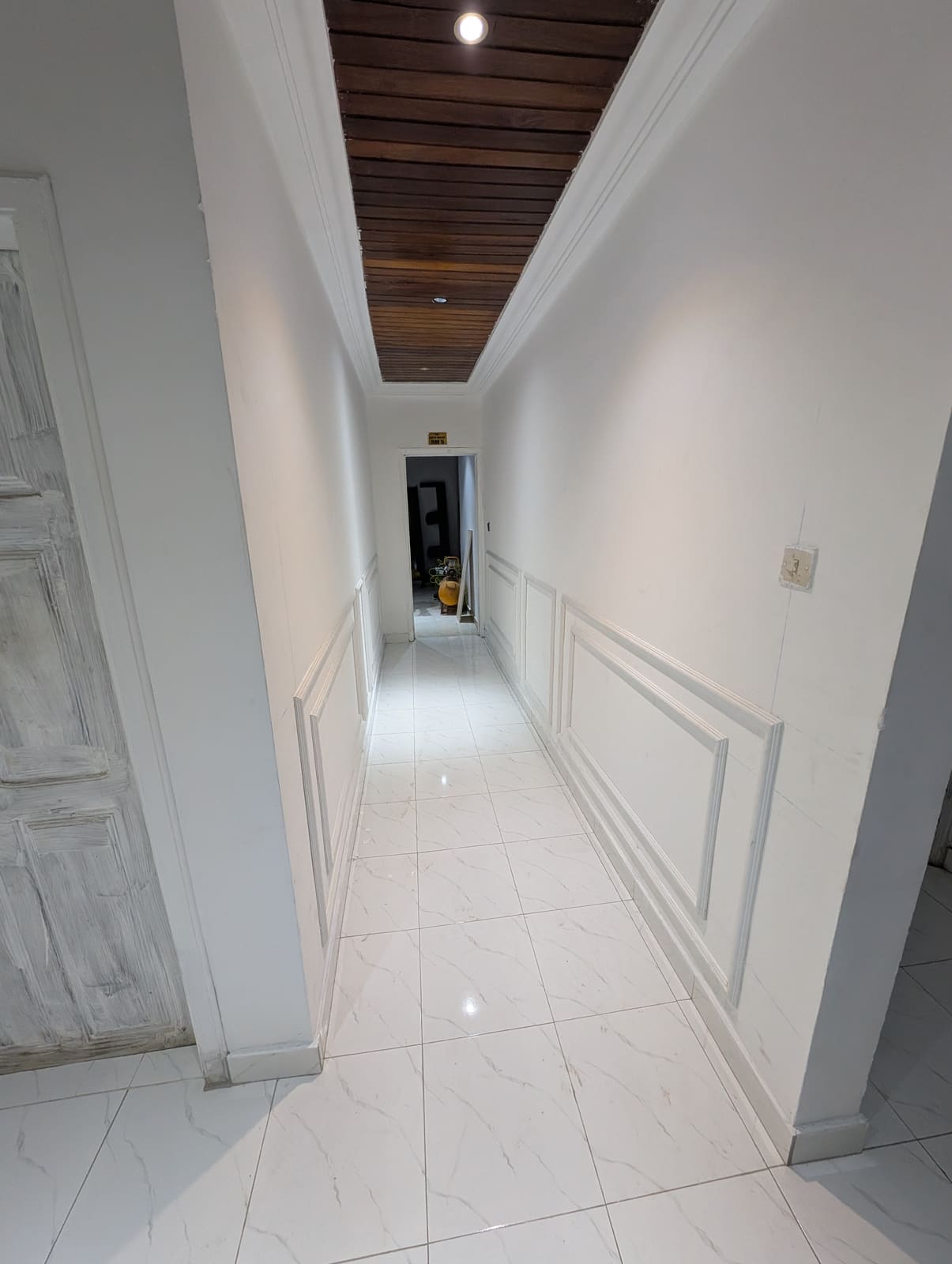Wainscot wall paneling, hallway leading to guesthouse room, Achimota