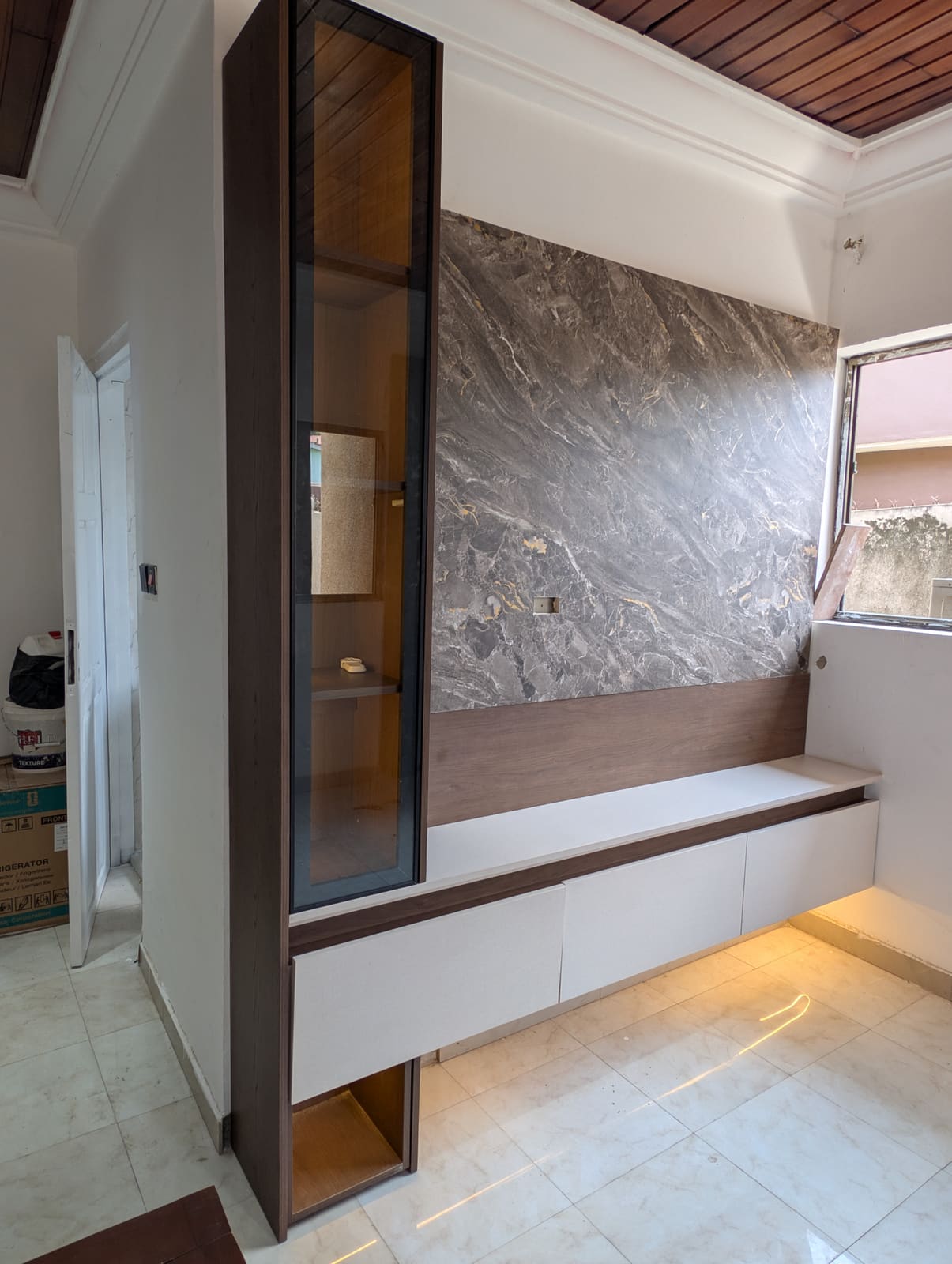 TV unit with marble feature wall, Achimota guesthouse room conversion