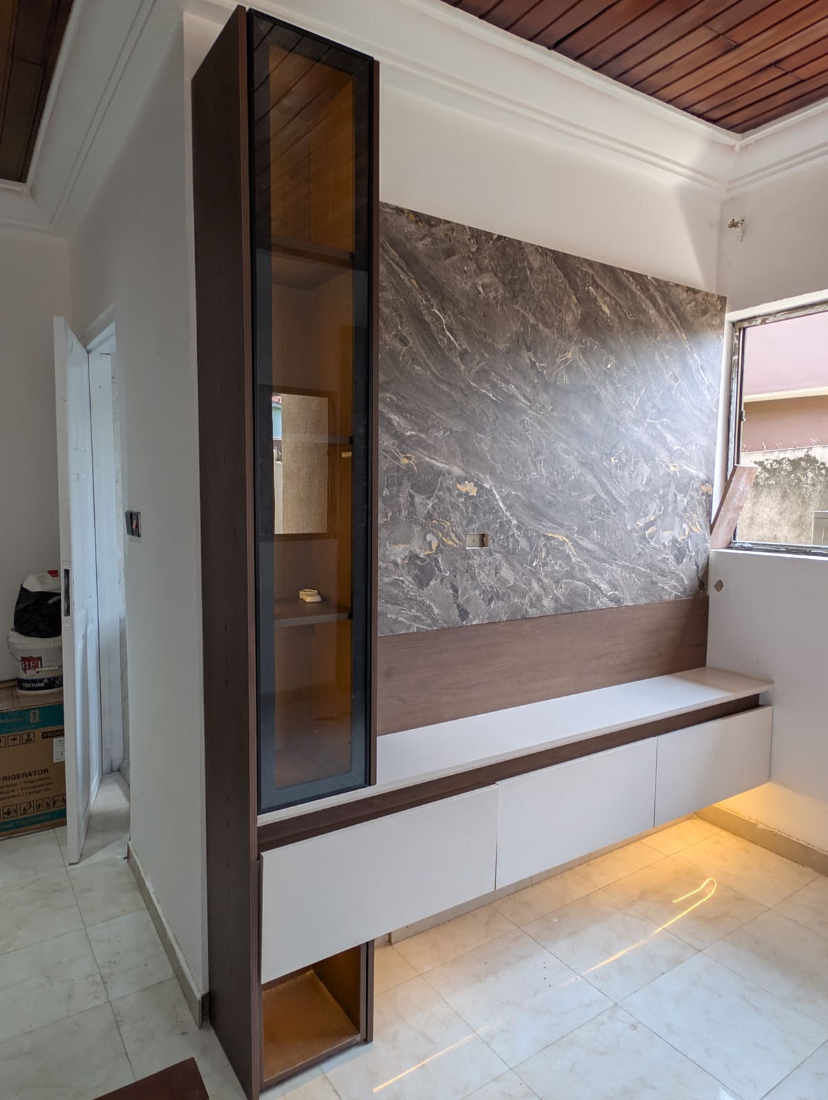 TV unit with marble feature wall, Achimota guesthouse room conversion