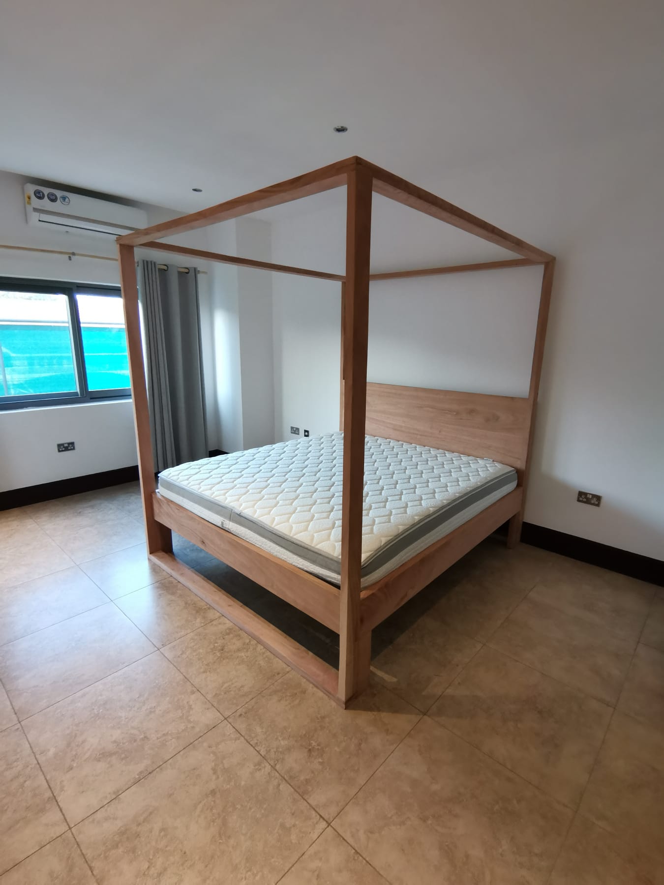 Custom solid wood four-poster bed