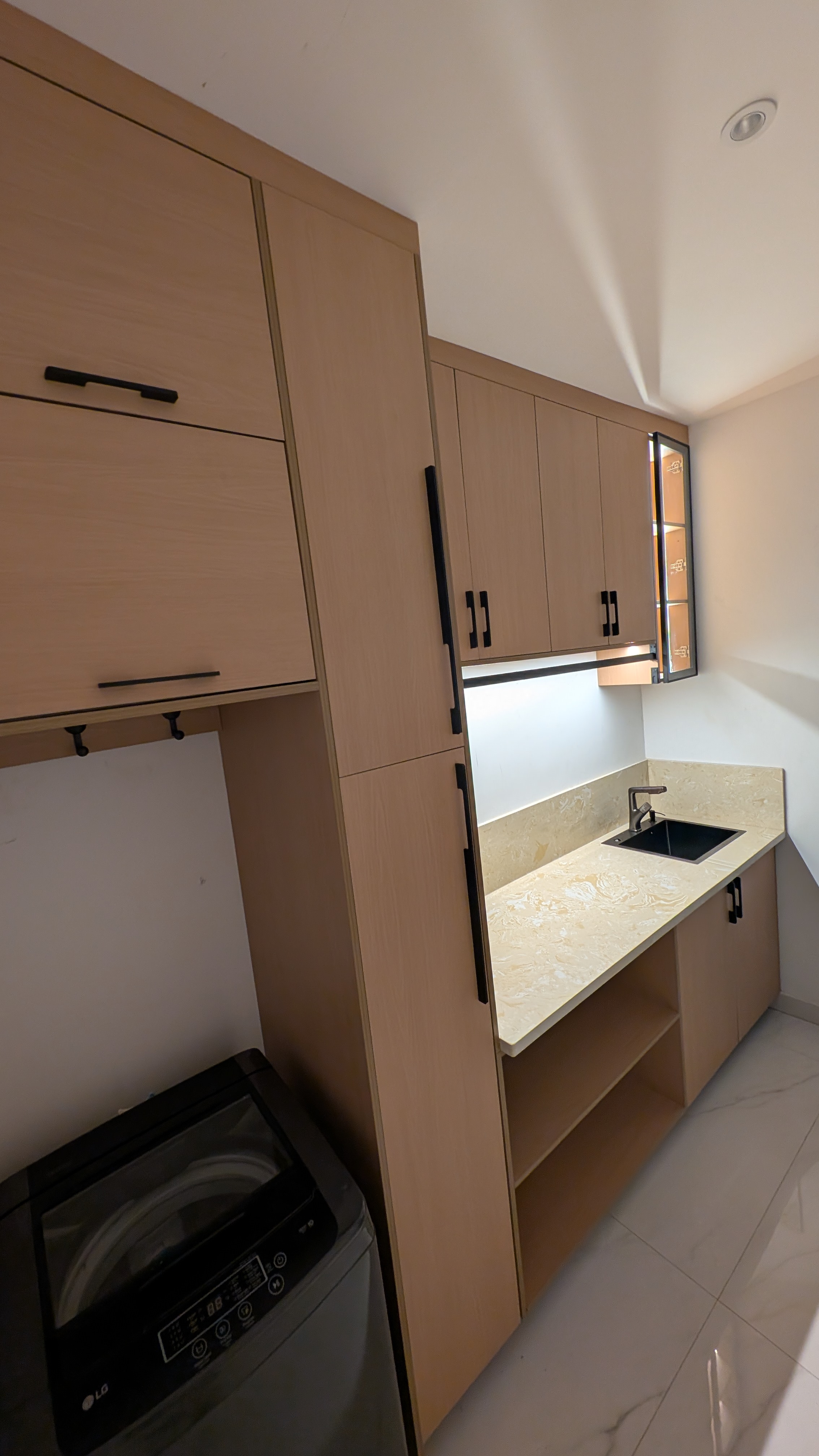 Laundry room — sink run and storage