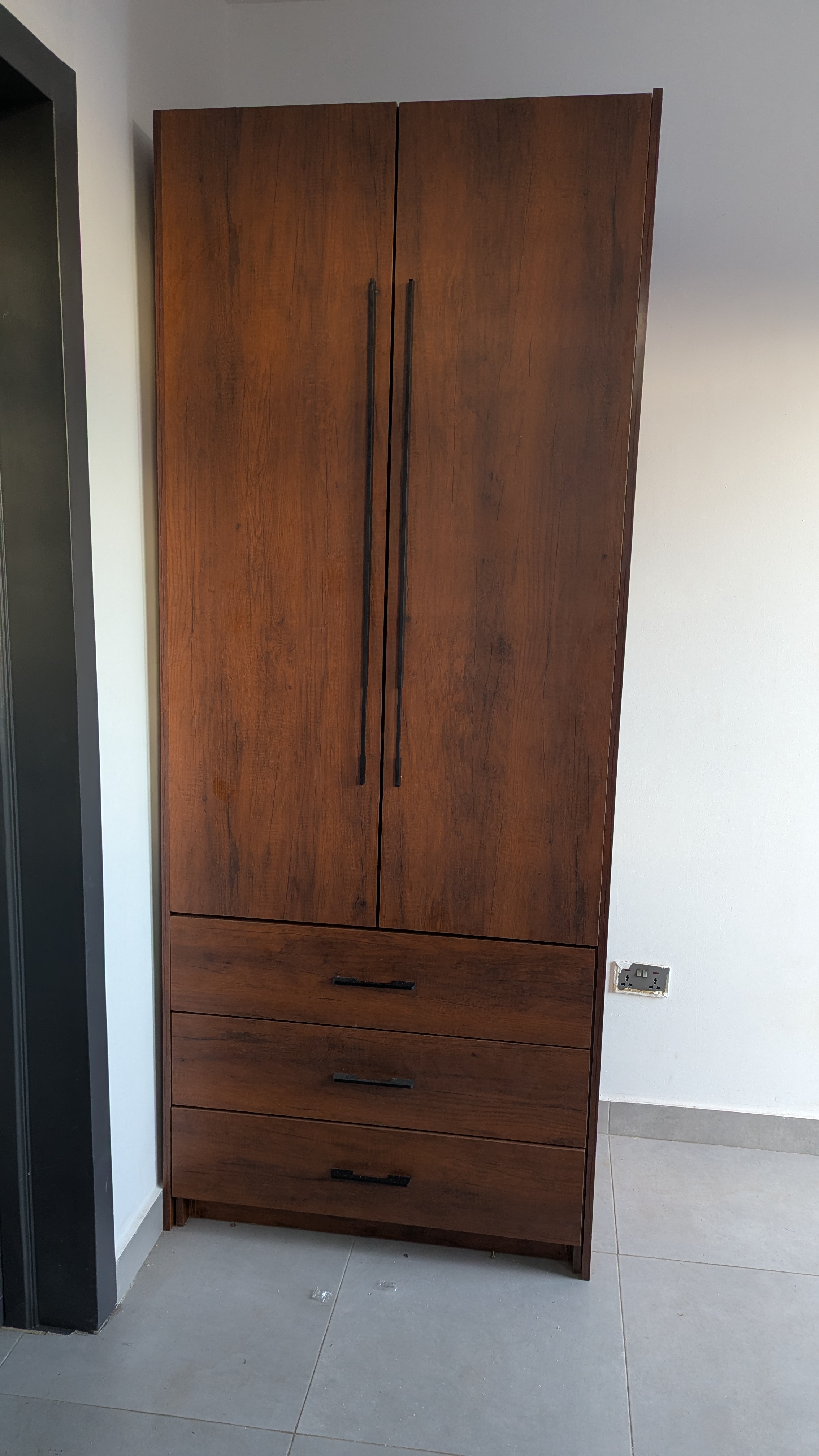 Dark rustic walnut-effect wardrobe — Dome, Accra 2025