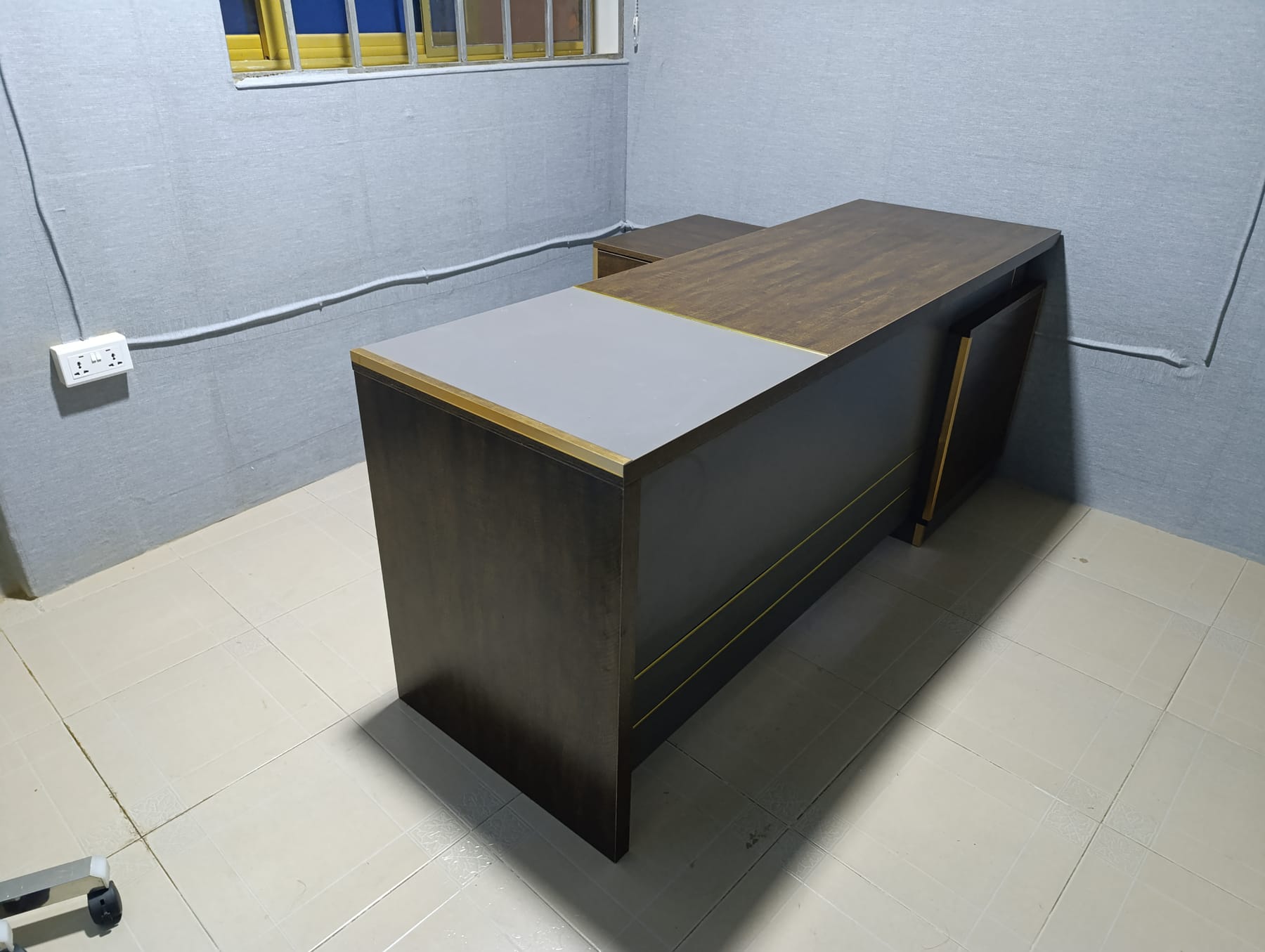 L-shaped office desk with drawer pedestal