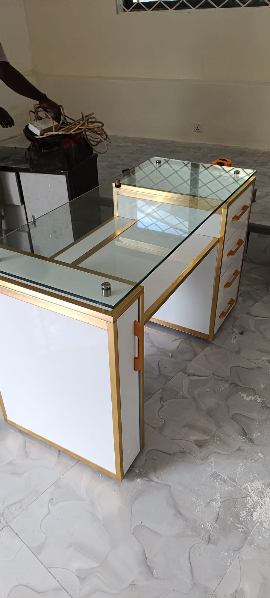 Reception desk with framed glass top