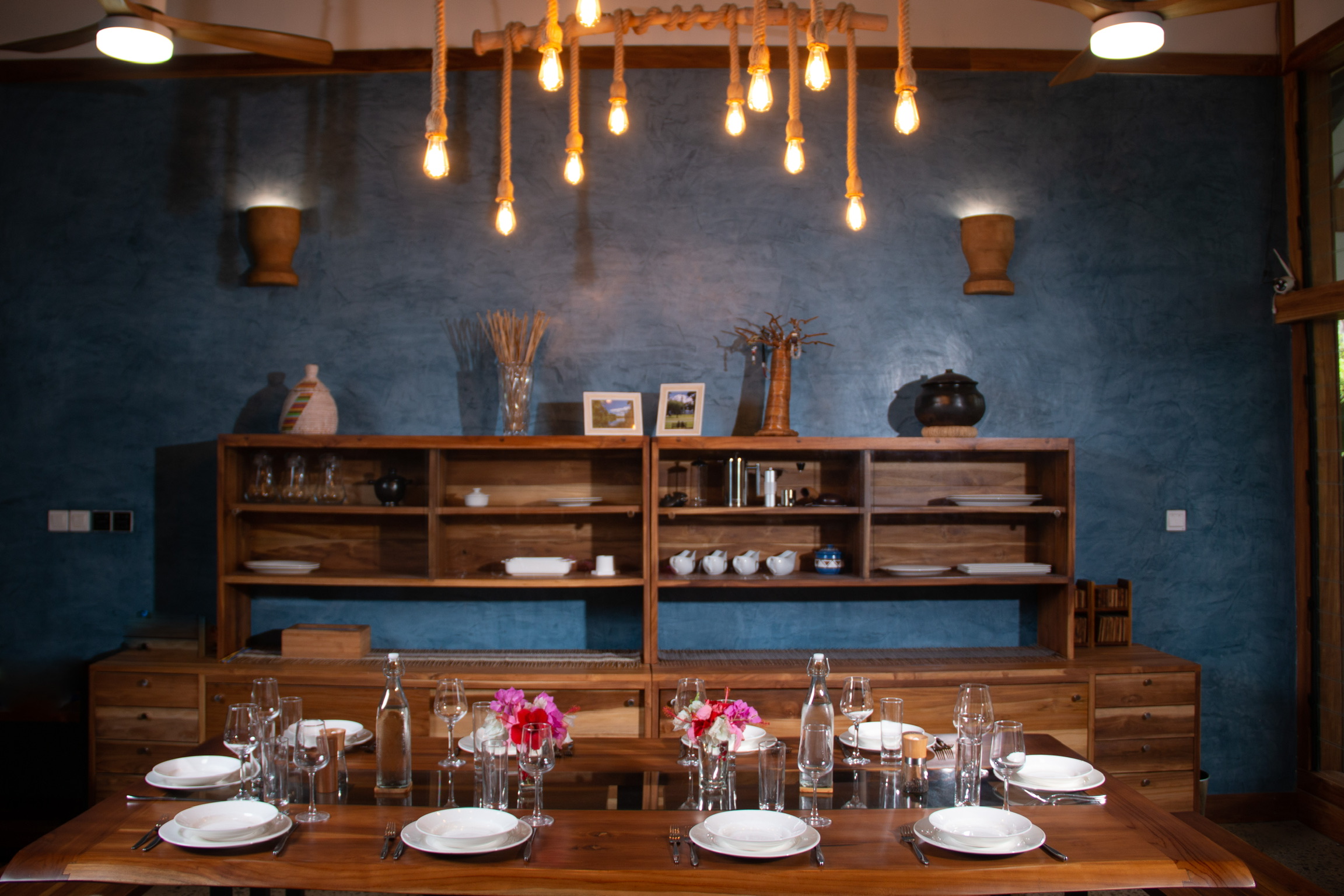 Dining room with live edge table and teak buffet unit