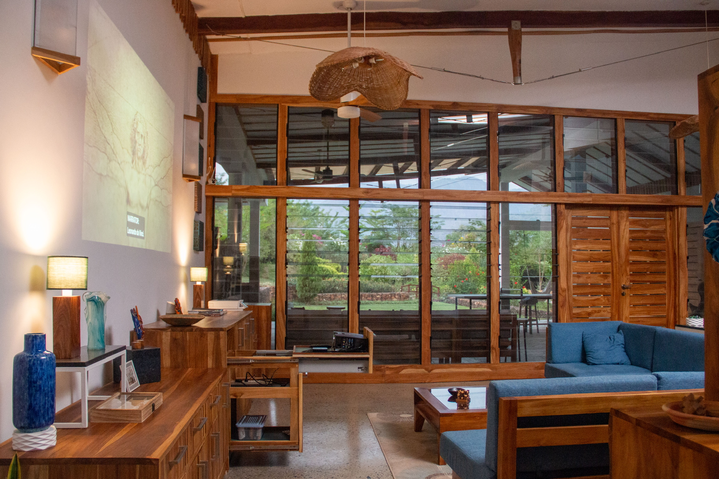 Evening view of the main living room at Sage Centre showing full teak fitout