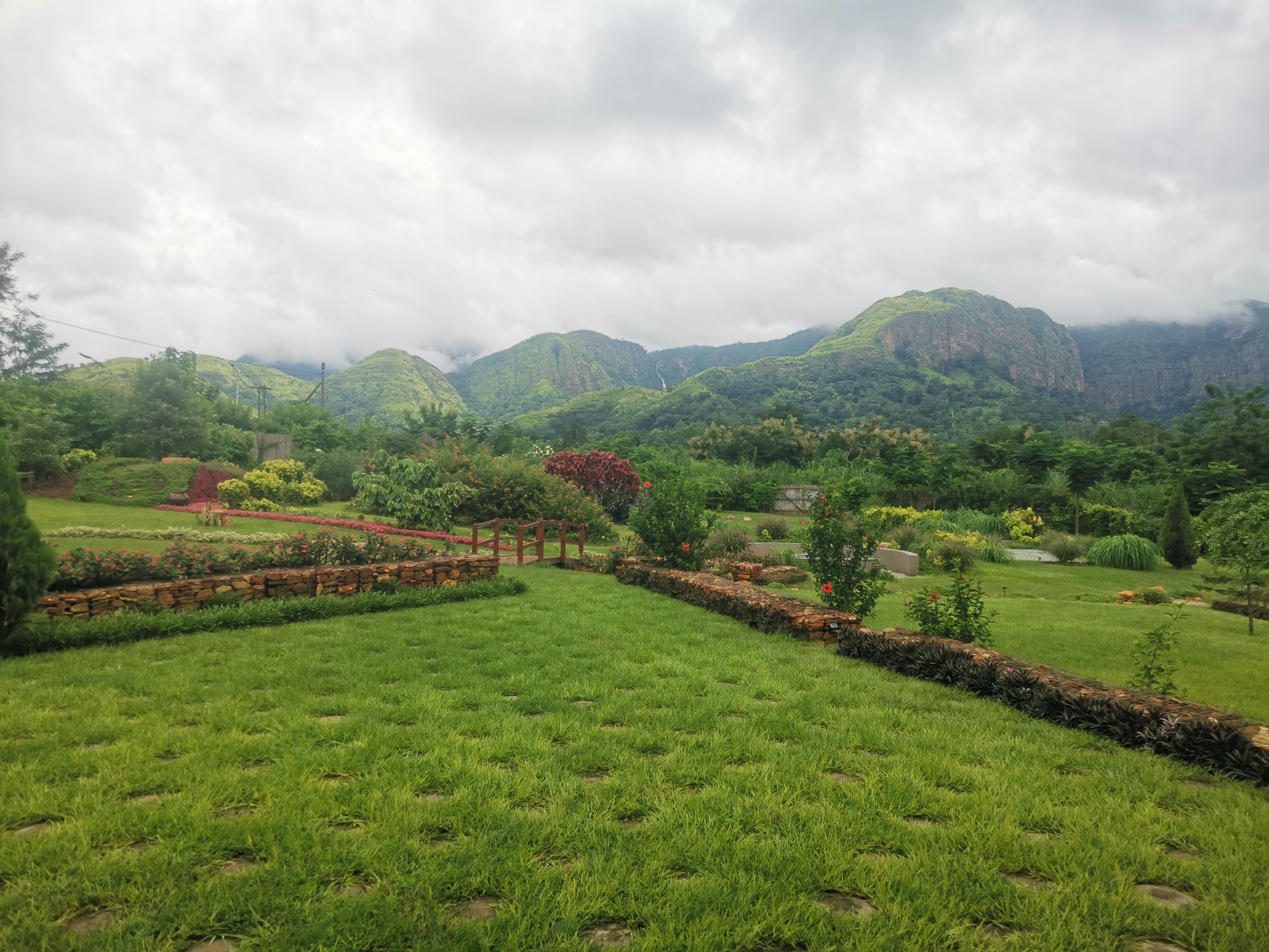 The grounds of Sage Centre, Wli — with the Agumatsa mountain range in the background