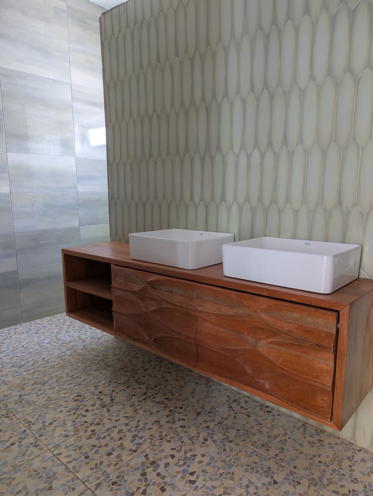 Smaller carved-door Khaya vanity, front view — Spintex, Accra